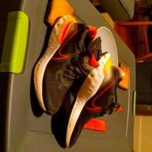 Nike shoes. Size 5.5 boys. Black and orange. Original price average is $70.00.